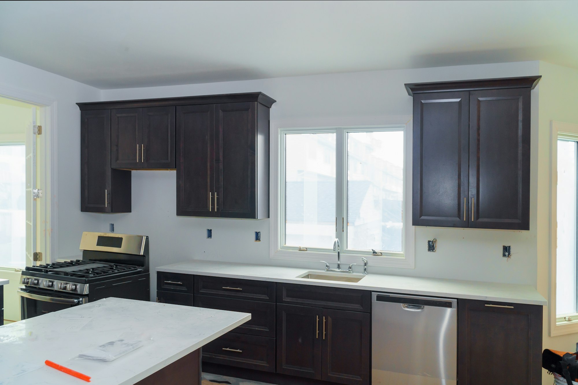 Home improvement kitchen remodel design construction of a kitchen with maple granite counter in home